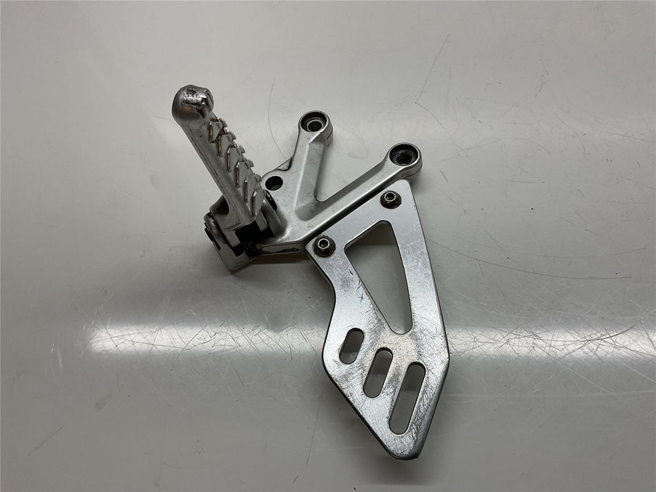 2010 Aprilia RSV4 R Front Left Footrest & Hanger - AP8146502