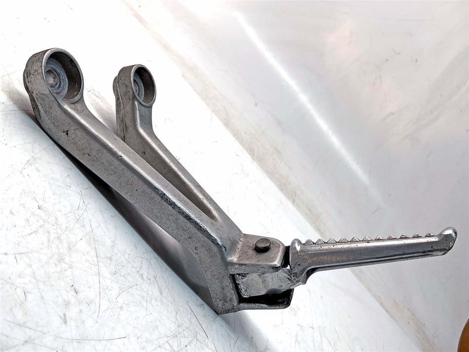 1999 Honda CBR900RR Rear Left Footrest & Hanger - 50730KT7760
